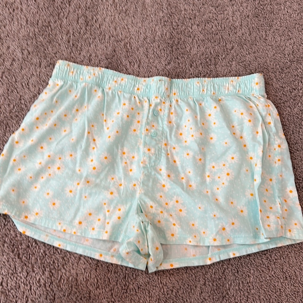 Victoria’s Secret pink shorts and a light turquoise color size small never worn